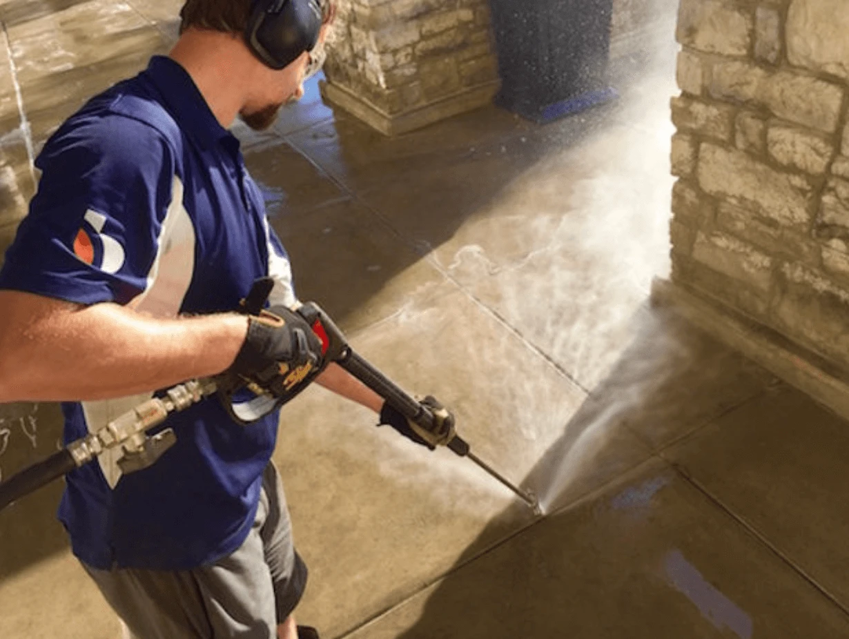 powerwashing sidewalk to remove gum